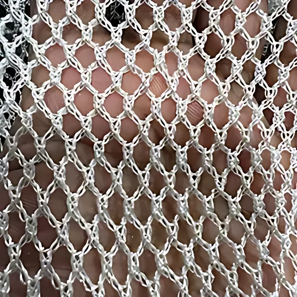 Close-up of white knitted polyester boom netting
